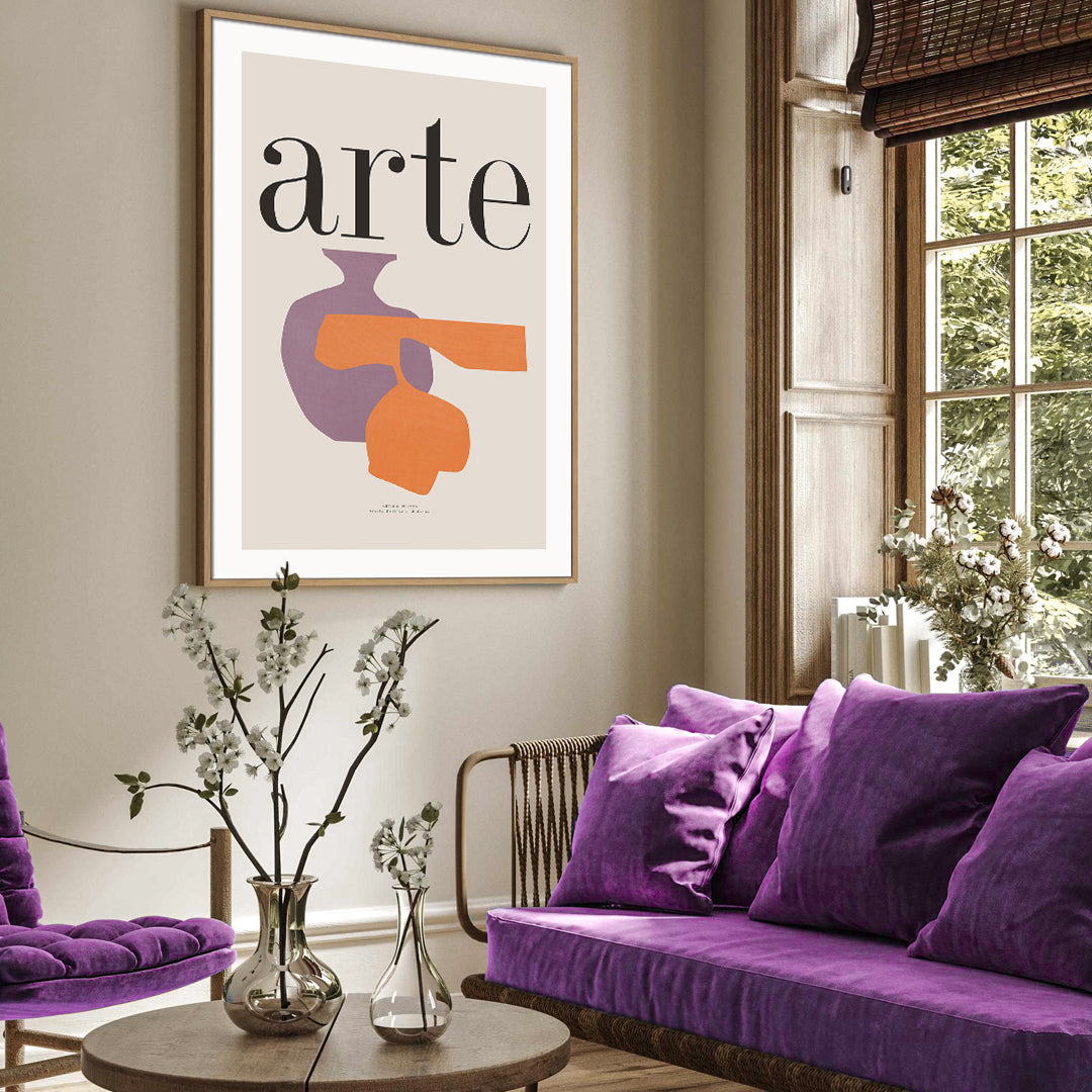 purple sofa, velvet, plush, round coffee table, beige walls, mid century artwork, thin wooden frames, living room, wall décor, modern design, glass vase, large bay window, branches in vase, bouquet